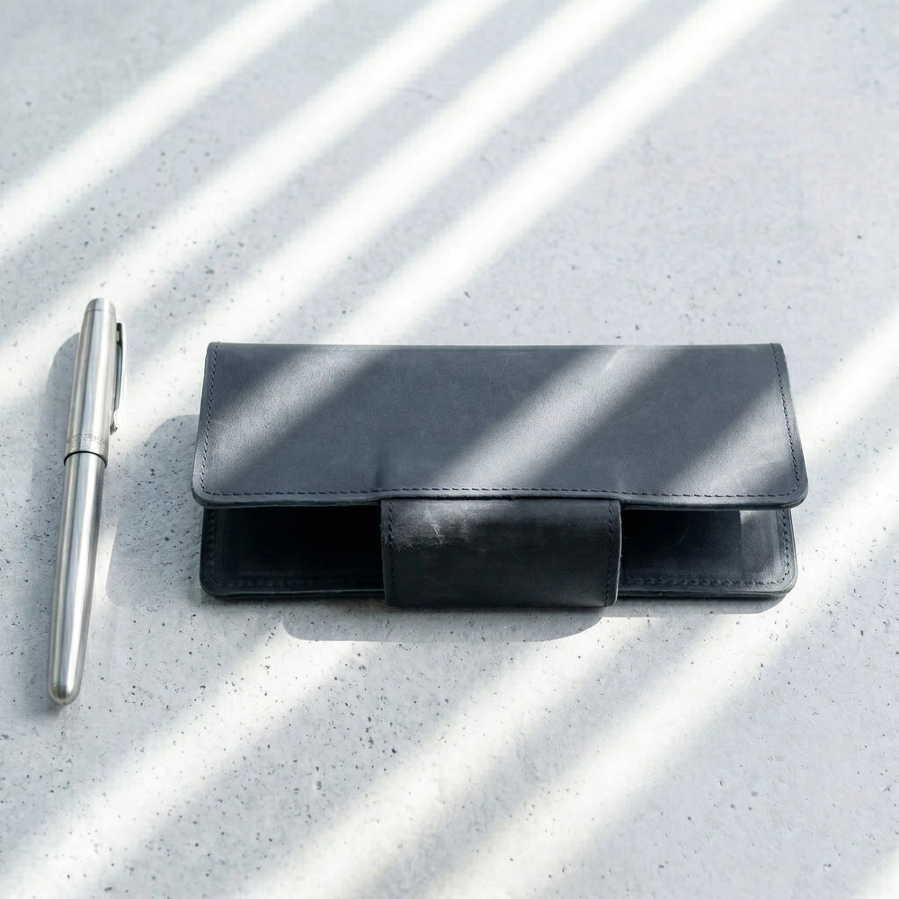 Unisex long leather wallet with snap closure in Midnight Navy Blue | Leathery