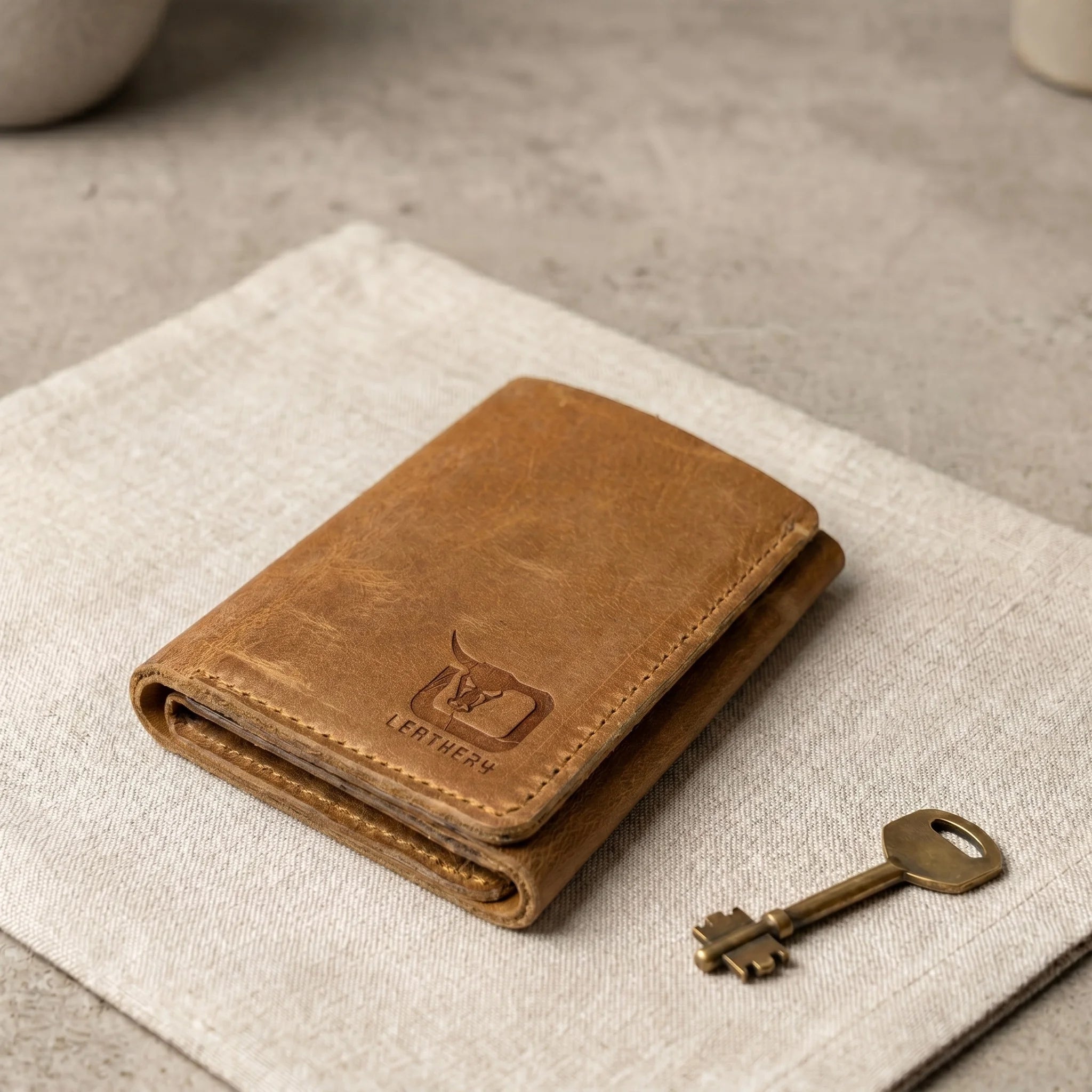 Men's small trifold leather wallet in Amber Saddle | Leathery