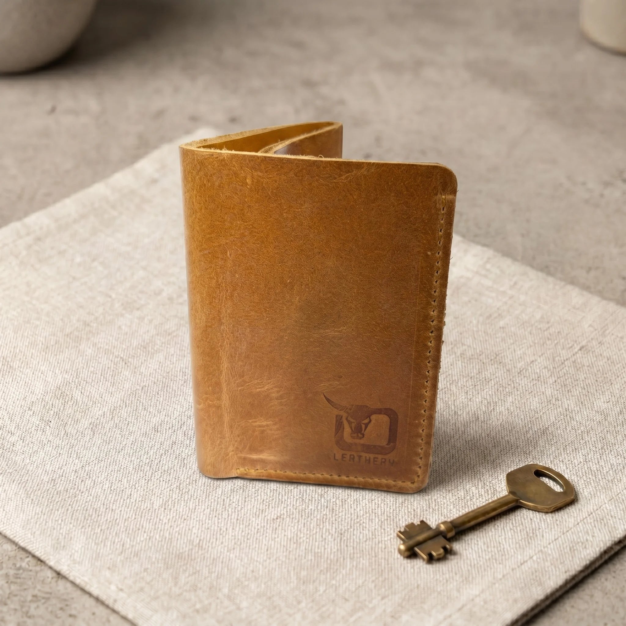 Men's small trifold leather wallet in Amber Saddle | Leathery