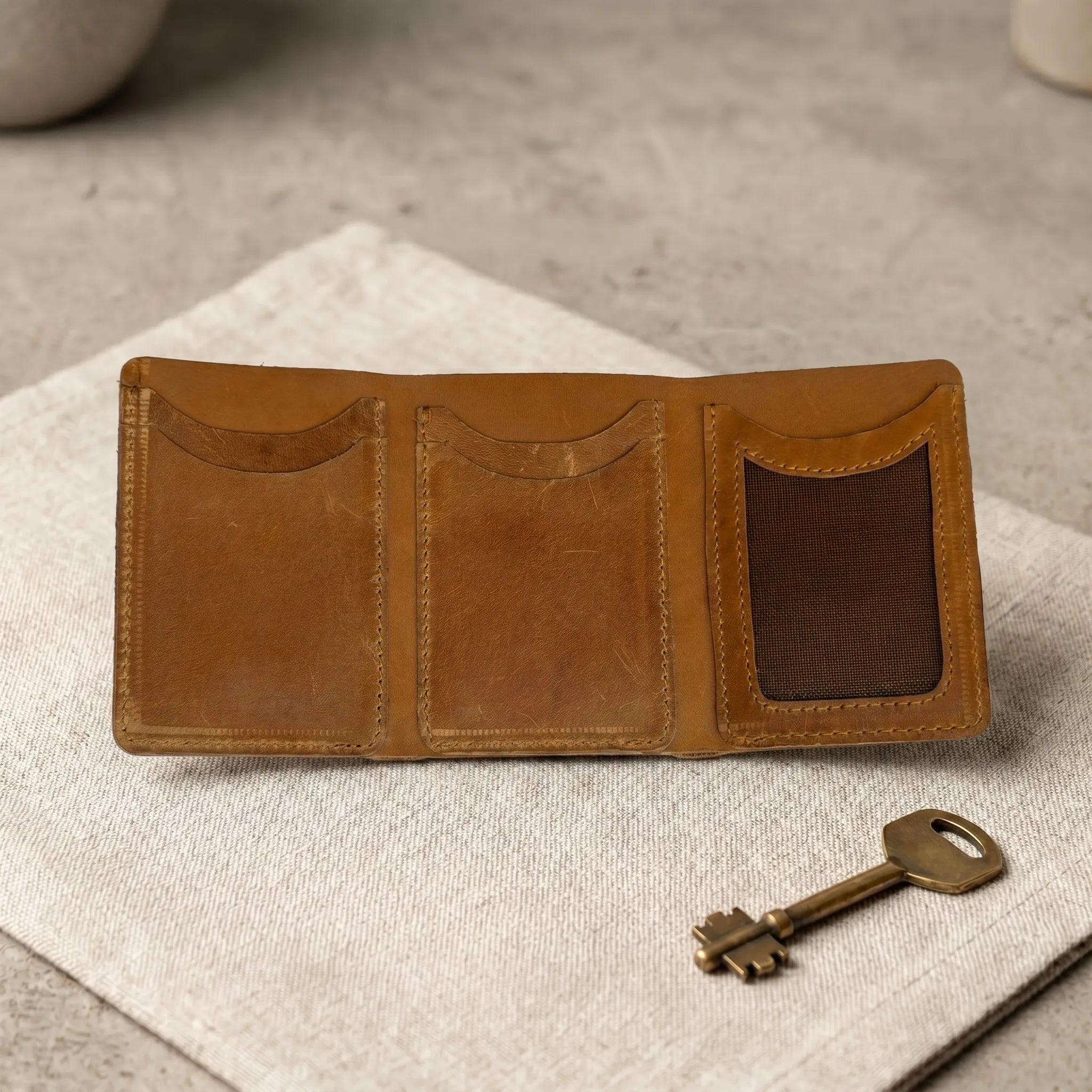 Men's small trifold leather wallet in Amber Saddle | Leathery