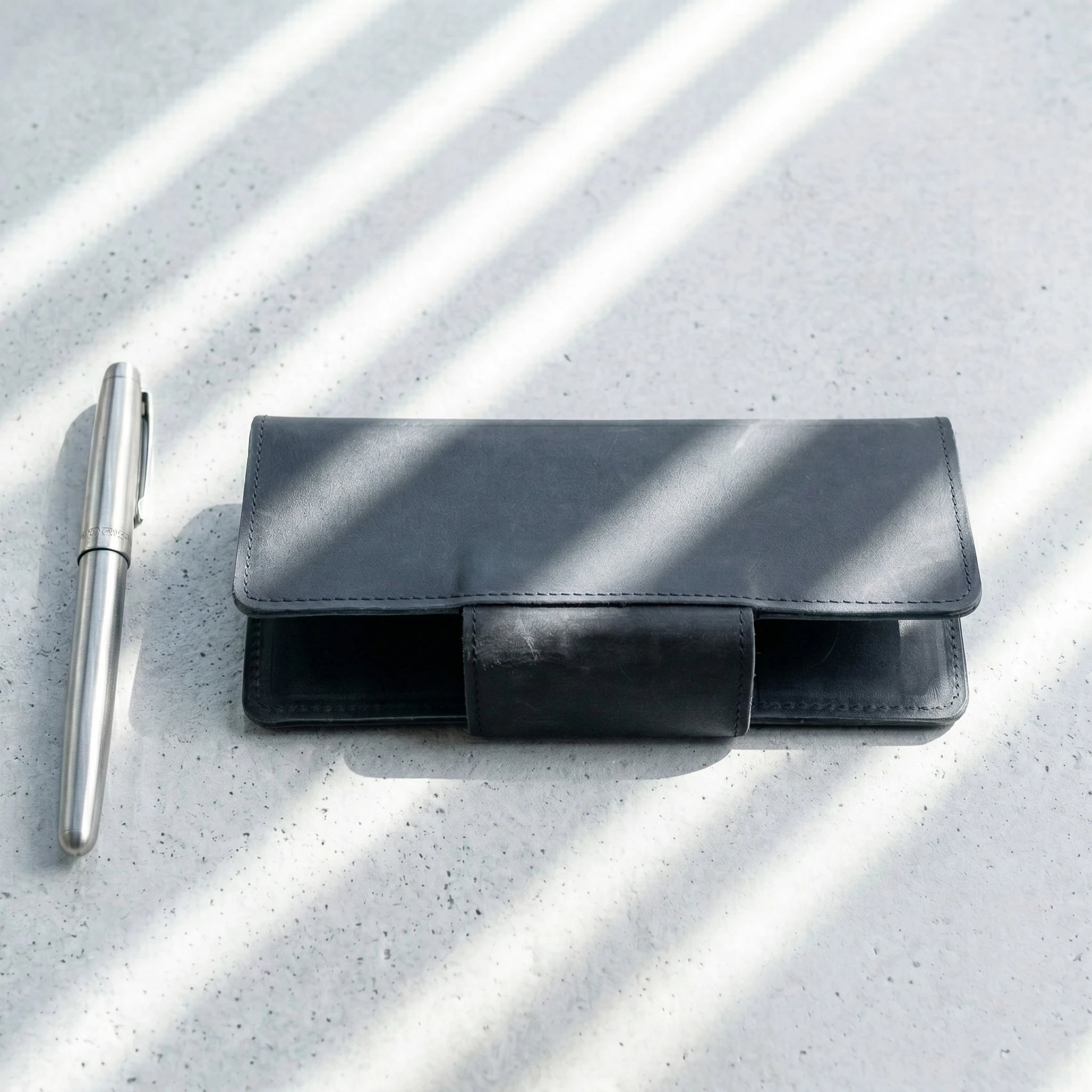 Unisex long leather wallet with snap closure in Midnight Navy Blue | Leathery