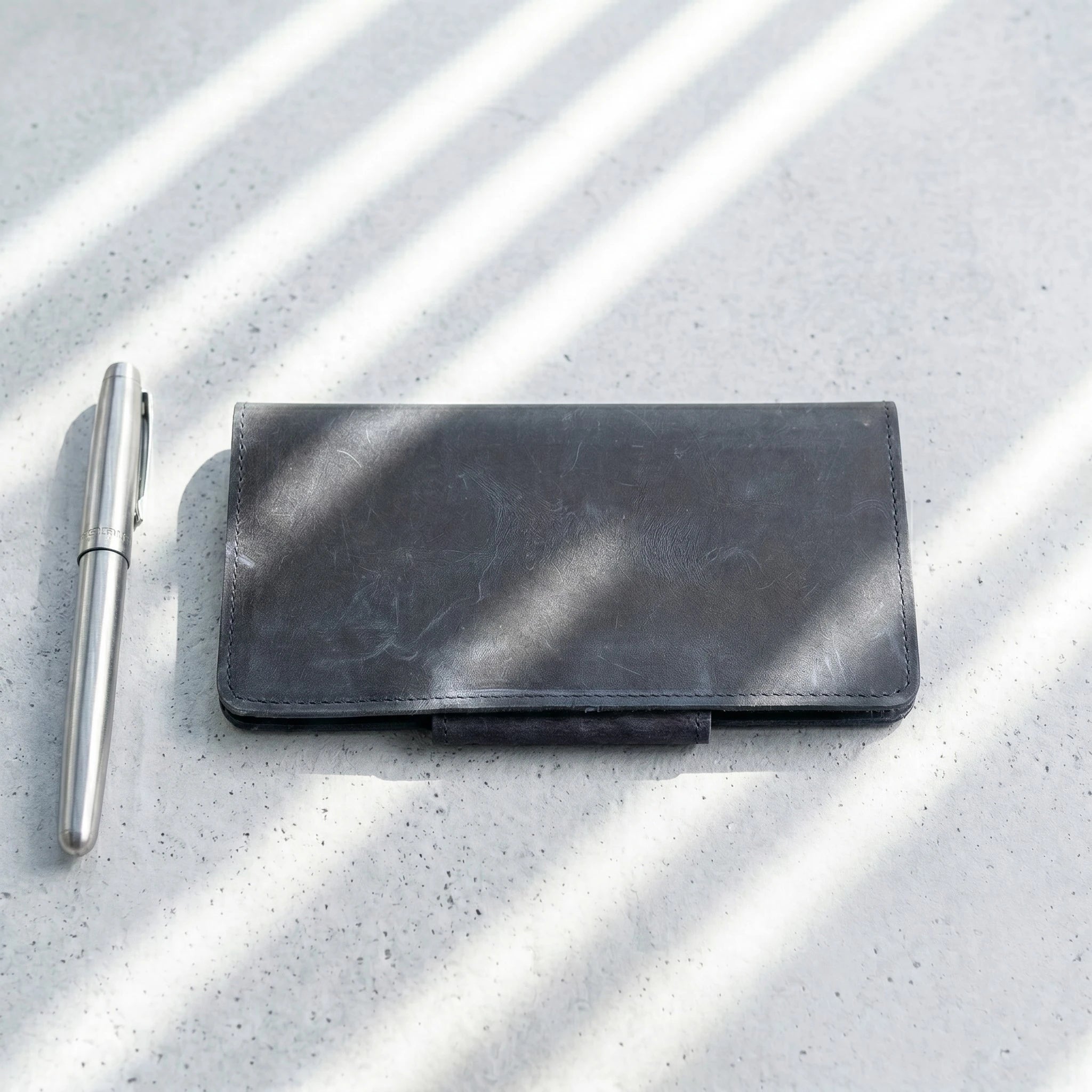 Unisex long leather wallet with snap closure in Midnight Navy Blue | Leathery