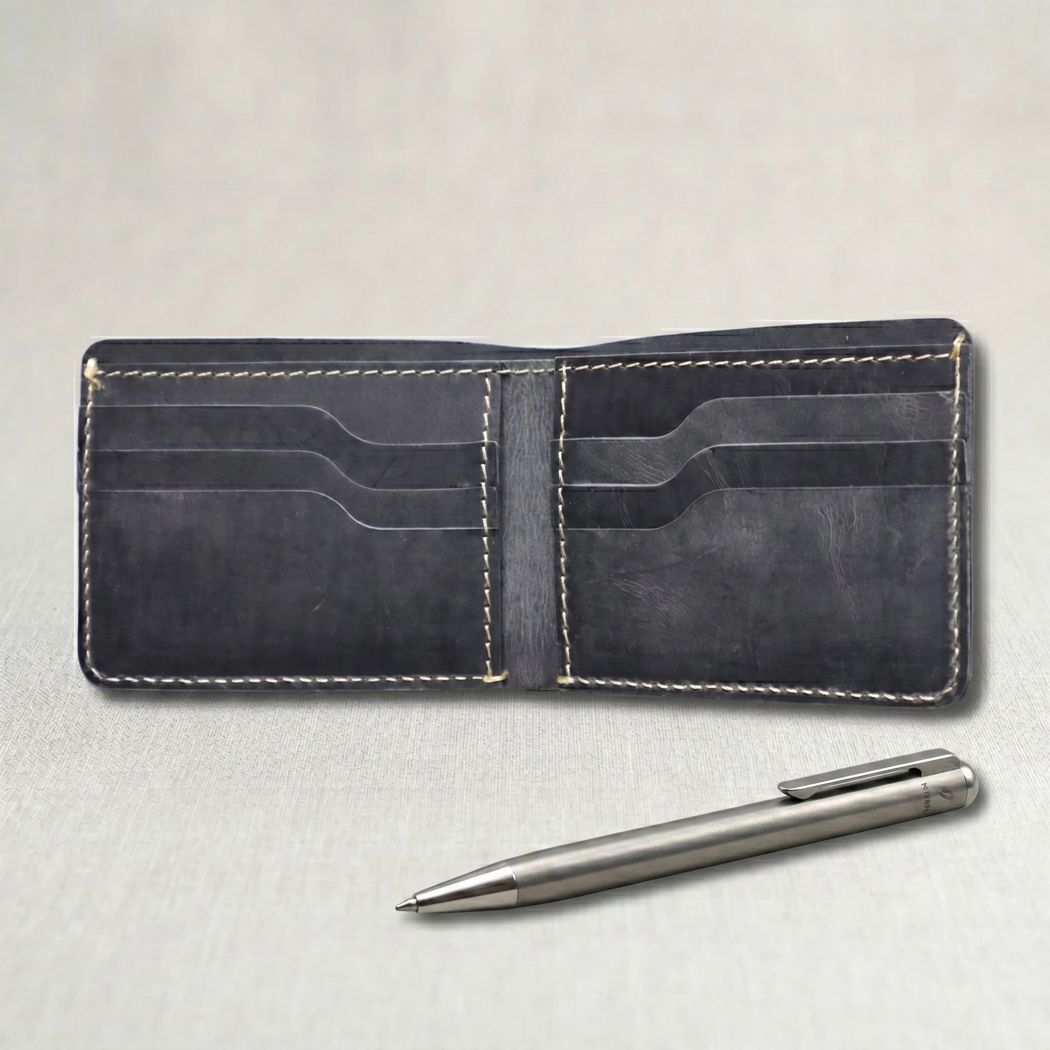 Men's dollar size bifold leather wallet in Charcoal Black | Leathery