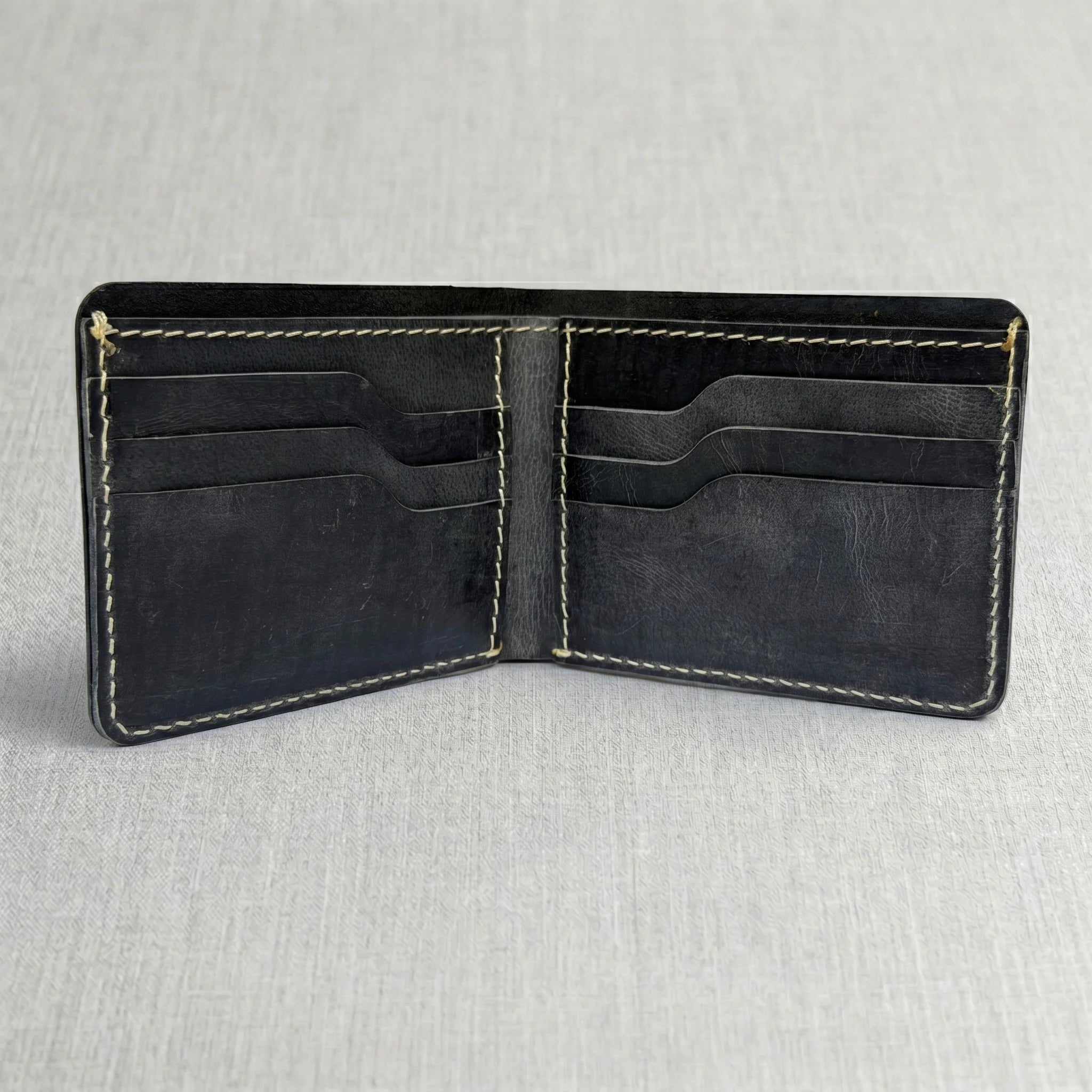 Men's dollar size bifold leather wallet in Charcoal Black | Leathery